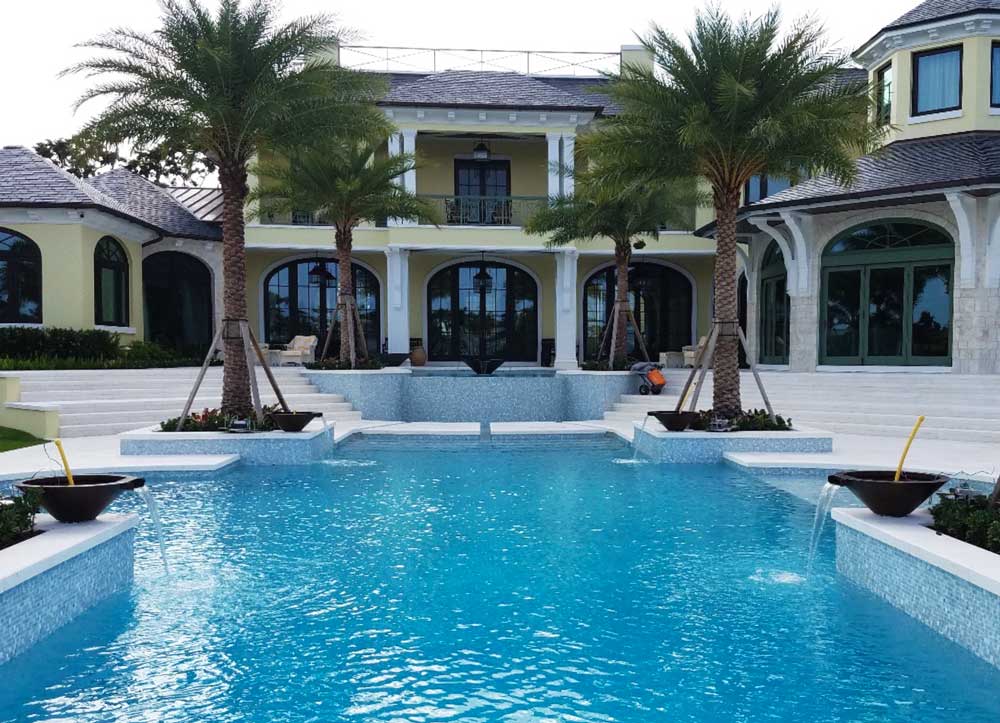 Naples, Florida home with residential pool cared for by Sapphire Pools of Florida, Inc.