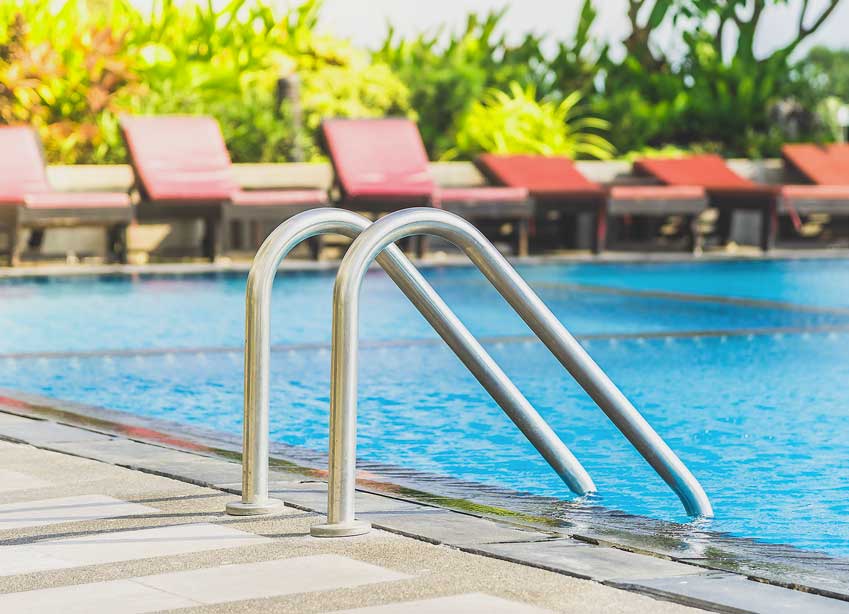 Pool ladder at the entry of swimming pool | Pool Equipment Serivces Sapphire Pools of Florida, Inc.
